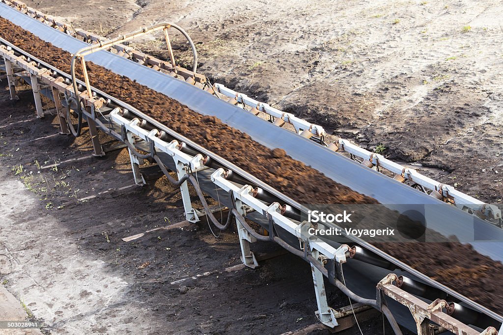 Opencast brown coal mine. Belt conveyor. Open pit. Opencast brown coal mine. Belt conveyor as industrial detail. Belt Stock Photo