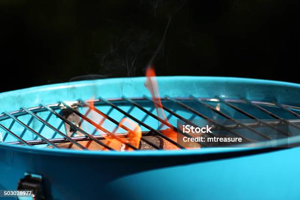 Lighting Charcoal Barbecue Bbq Image Flames On Kettle Barbecue Coals Stock Photo - Download Image Now