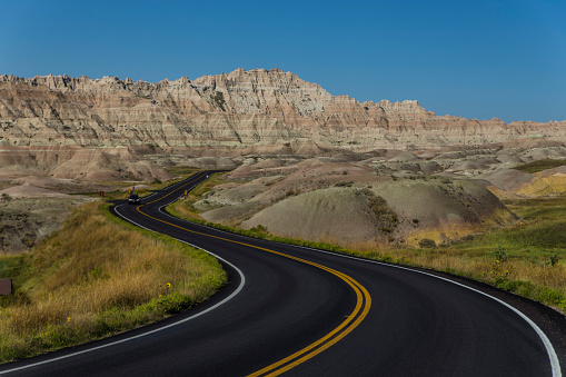 This road goes through hardly habitable Badlands in South Dakota.