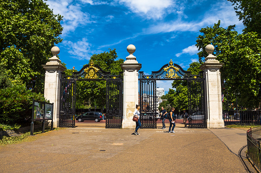 London, UK - June 4, 2015: Unidentified people near Golden Gate of St James park