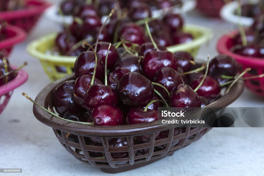Farmers Market Fresh locally grown red bing cherries in baskets on display at local farmers market Agriculture Stock Photo