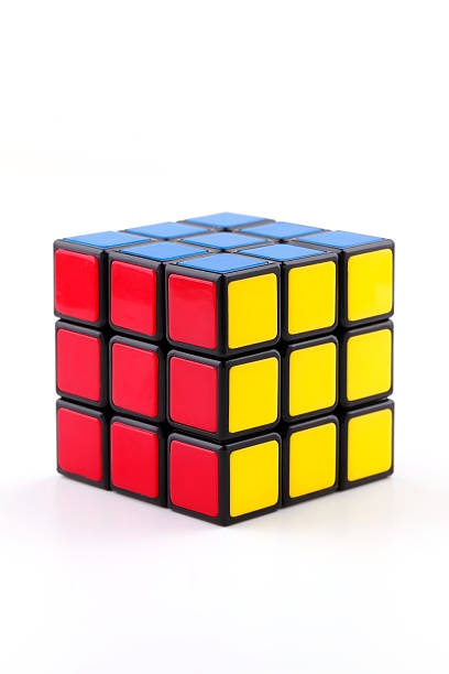 Rubik's Cube Istanbul, Turkey - July 19, 2014: A Classic Rubik's Cube on a white background. Rubik's Cube invented by a Hungarian sculptor and professor Ernő Rubik in 1974. puzzle cube stock pictures, royalty-free photos & images