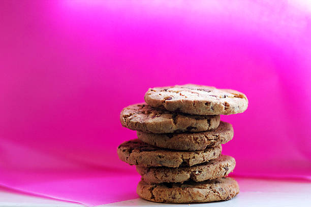 istock Cookies and pink background 503044704