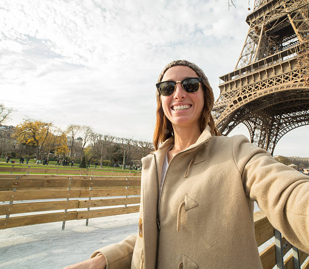 istock Young woman capturing vacations in Paris, selfie 503044714