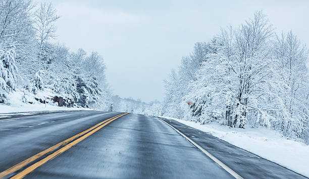 istock Speeding on Rural Winter Blizzard Highway 503047460