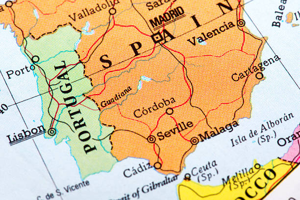 A close-up/macro photograph of Spain from a desktop globe. Adobe RGB color profile.