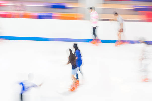 istock Blur motion image of people ice skating 503049526