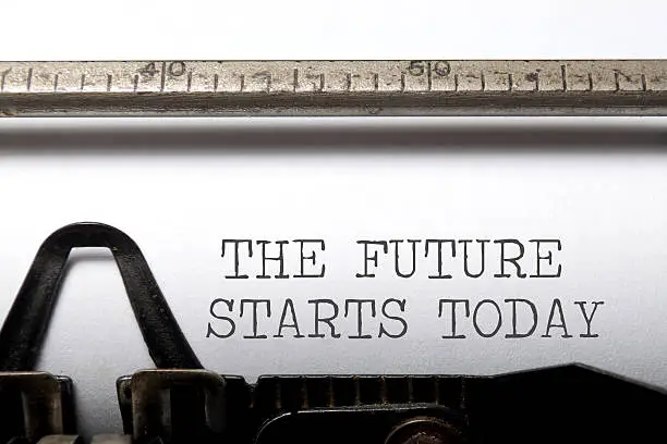 The future starts today printed on a typewriter