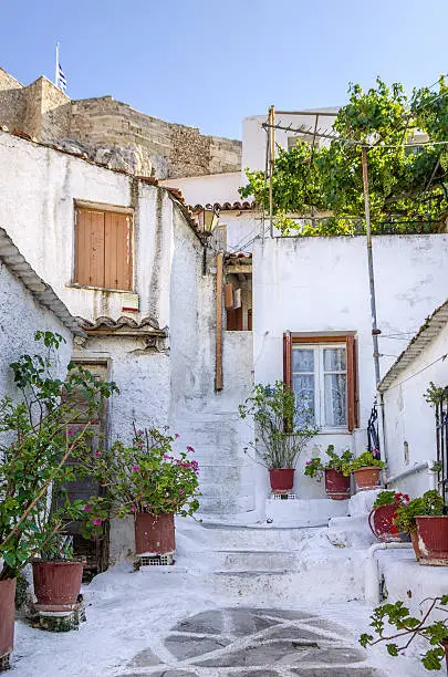 Photo of Old buildings under the Acropolis in Anafiotika neighborhood, Athens, Greece