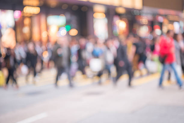 Blur movement of city people Blur movement of city people worker, shopping on Street in hongkong high street stock pictures, royalty-free photos & images