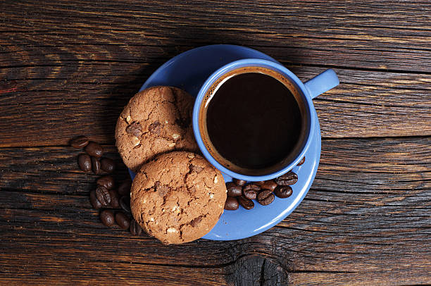 istock Blue cup of coffee with cookies 503053810