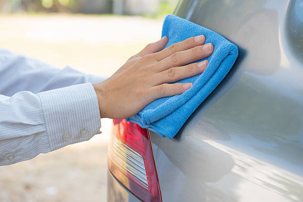 istock Cleaning the car with microfiber cloth 503054484