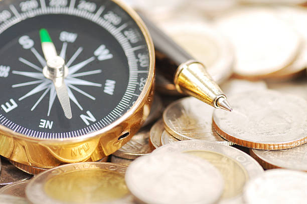 istock compass and pen on money background 503054924