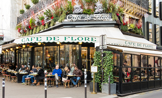 Paris; France-December 27, 2015 :The cafe De Flore located at the corner of boulevard Saint Germain and rue Saint Benoit . It was once home to intellectual stars, from Hemingway to Pablo Picasso