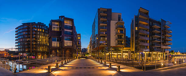 istock Modern waterfront apartments illuminated at dusk Aker Brygge Oslo Norway 503070027