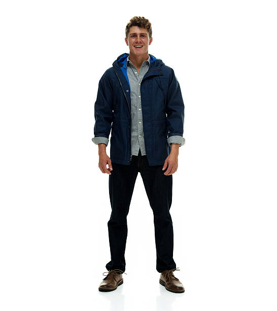 istock Smiling casual man standing and looking at camera 503071276