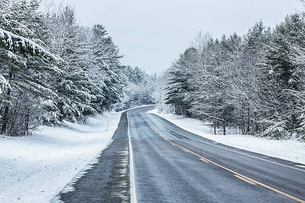 istock Rural Highway Curve - Adirondacks Winter Blizzard Snow Storm 503071528