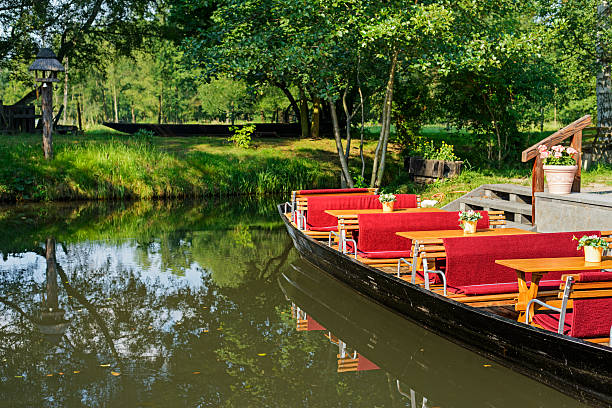Wooden boat in the Spreewald Typical wooden boat in the Spreewald. Brandenburg, Germany spreewald stock pictures, royalty-free photos & images