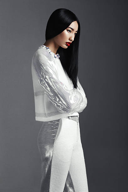Fashionable Asian woman Beautiful asian woman wearing trendy white suit. Professional make-up and hairstyle. High-end retouch. stage make up photos stock pictures, royalty-free photos & images