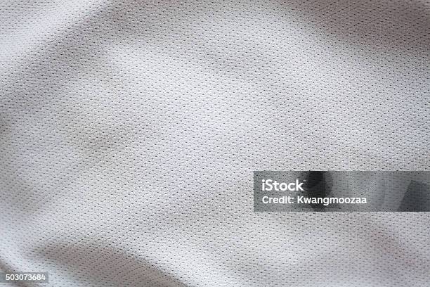 Close Up Shot Of White Textured Football Jersey Stock Photo - Download Image Now - Textured, Sports Jersey, Textile