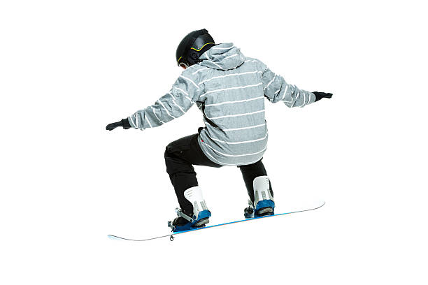istock Rear view of snowboarder snowboarding 503074216
