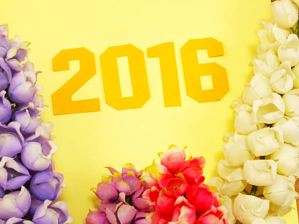 istock 2016 new year bacground decoration with beautiful artificial flo 503074610