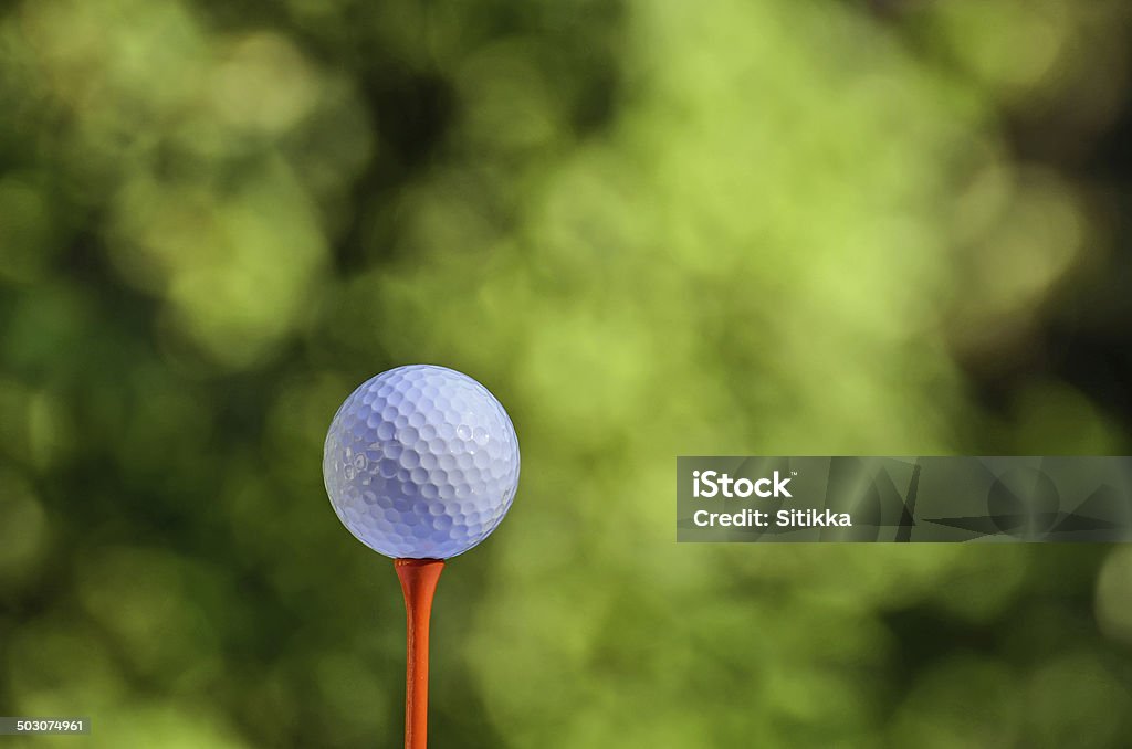 golf ball Golf ball on tee Copy Space Stock Photo