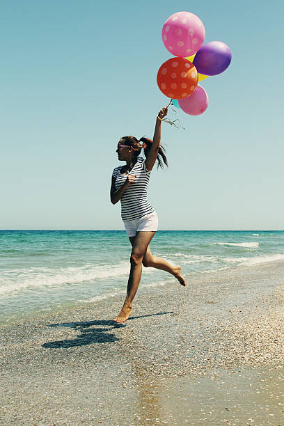 istock beautiful woman on seaside 503074973