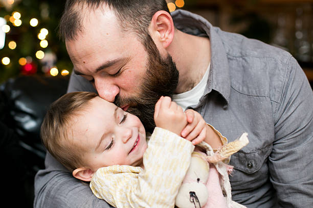 istock Father kisses his daughter 503075206