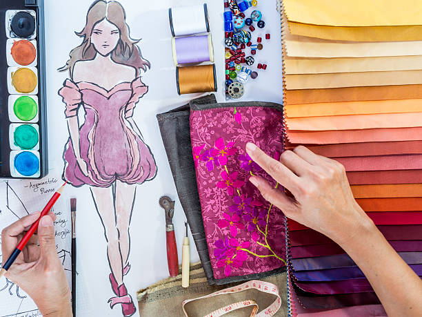 istock Fashion designer working with material sample and hand-drawn illustration 503075267