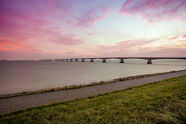 istock bridge over the sea 503079716