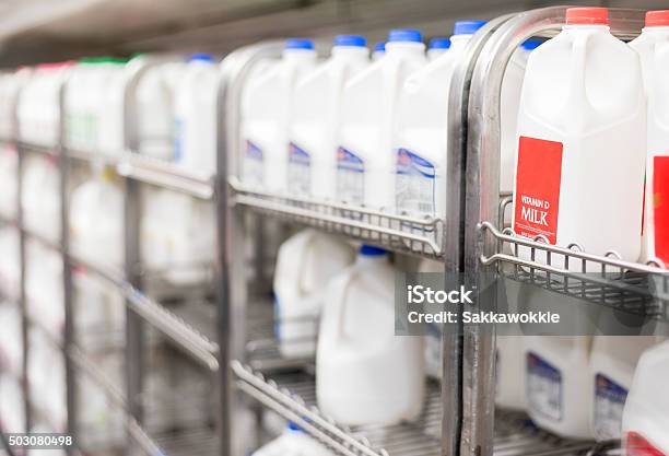 Shelves Of Refrigerated Milk In Store Stock Photo - Download Image Now - Milk, Supermarket, Gallon