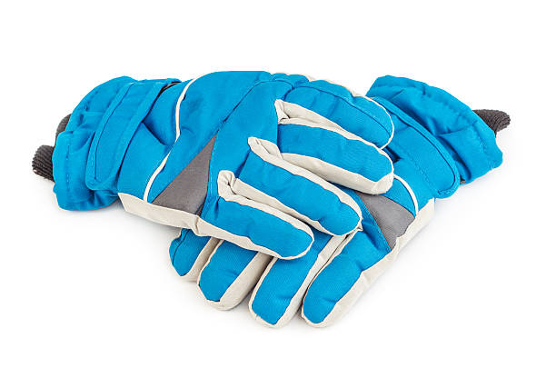 Winter blue ski gloves isolated on white background