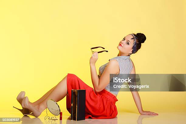 Full Length Of Fashionable Pinup Girl With Bun On Yellow Stock Photo - Download Image Now