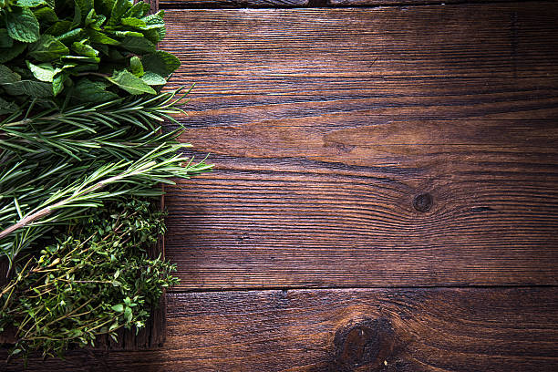 istock Fresh aromatic herbs on wooden background 503082284