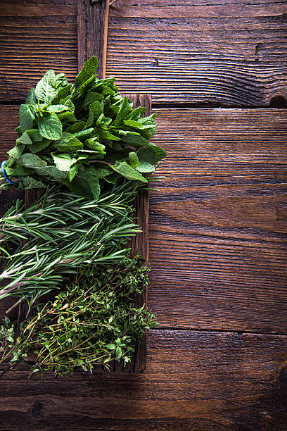 istock Fresh aromatic herbs on wooden background 503082450