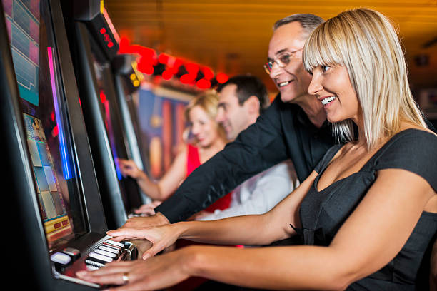 istock People gambling on slot machines. 503082545