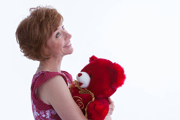 istock Woman With Teddy Bear 503083367