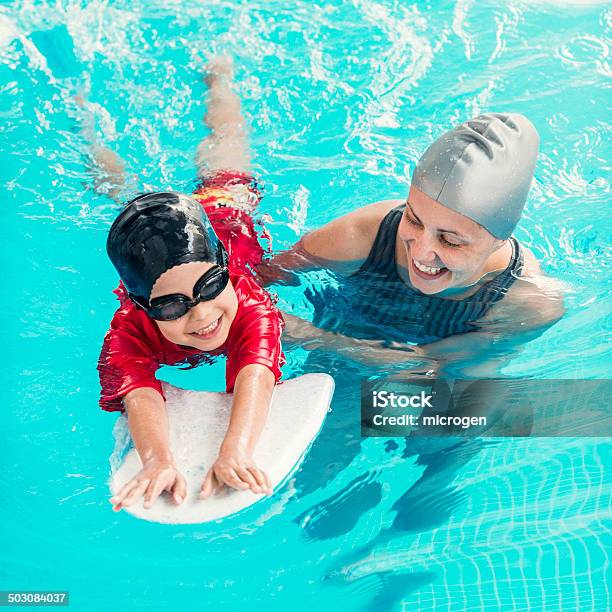 Learning Swimming Stock Photo - Download Image Now - Learning, Swimming, Child