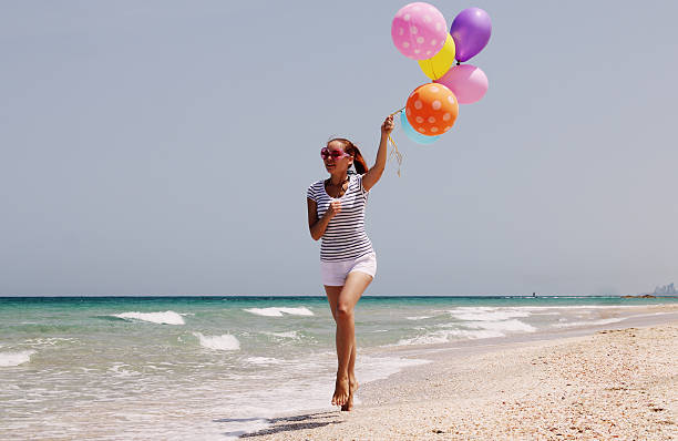 istock beautiful woman on seaside 503084293
