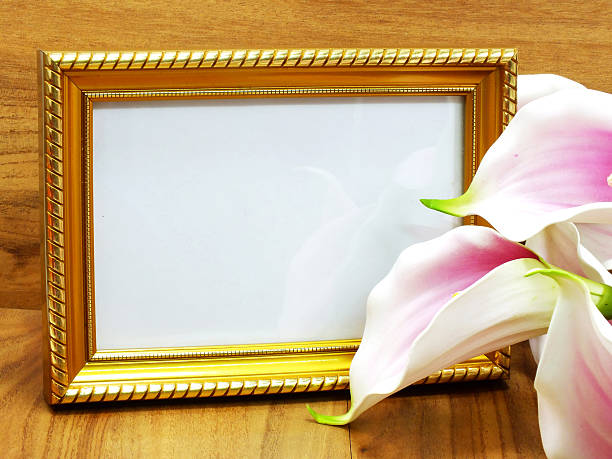 istock blank photo frame and artificial flower 503084432