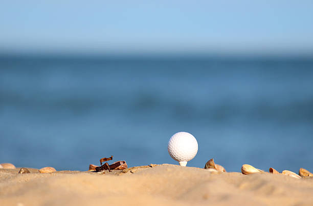 istock Image of beach golf / golf ball on sandy seaside beach 503085183