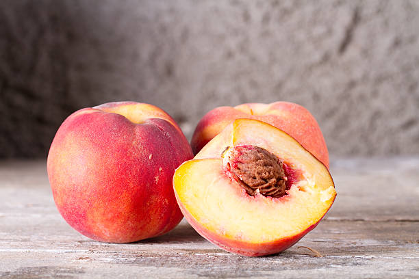 istock The ripe whole and sliced peaches 503086450