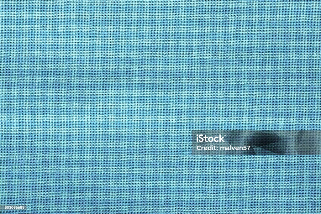 checkered fabric of turquoise color texture of textile checkered fabric of turquoise color for abstract backgrounds Abstract Stock Photo