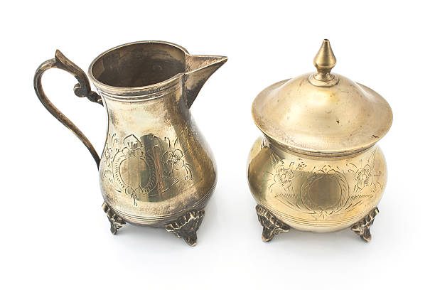 istock Antique silver jug and sugar bowl on white 503088633