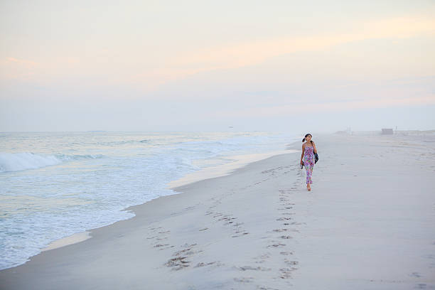 istock Girl running at the beach 503088939