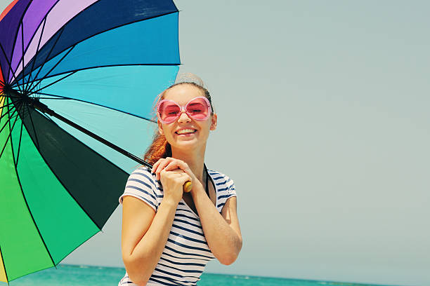istock woman with umbrella 503089343