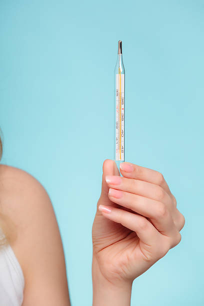 istock Flu cold fever. Mercury thermometer. Health. 503089379