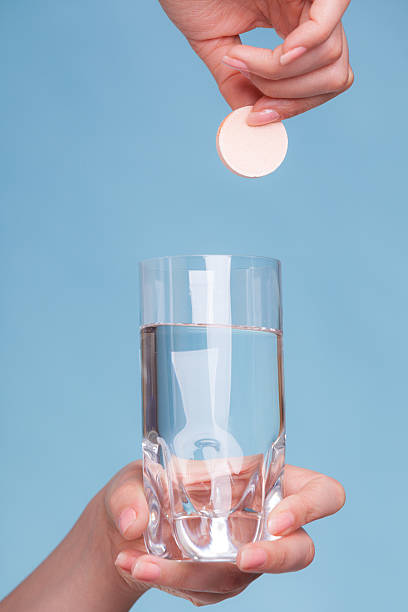 istock Aspirin pill tablet and glass water for headache 503089385