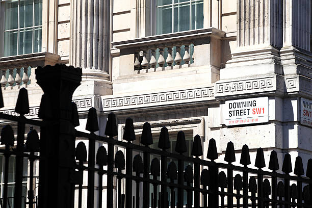 Downing Street London, UK - July 14, 2014 : Number10 Downing Street in Whitehall is home of the British Prime Minister and where the government hold frequent cabinet meetings chancellor photos stock pictures, royalty-free photos & images